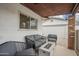 Cozy outdoor patio featuring comfortable seating and a modern fire pit area at 2254 S Noche De Paz --, Mesa, AZ 85202