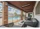 Covered patio with outdoor seating overlooking a swimming pool and lounge area at 2254 S Noche De Paz --, Mesa, AZ 85202