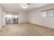 Bedroom with sliding glass doors and access to a balcony at 27002 N 64Th St, Scottsdale, AZ 85266