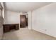 Bedroom features desk, carpet and door to another room at 27002 N 64Th St, Scottsdale, AZ 85266