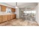 Kitchen with beautiful tile floors and sliding glass doors to an outdoor patio area at 27002 N 64Th St, Scottsdale, AZ 85266