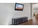 Living room features hardwood floors, with built-in TV mount at 29243 N 122Nd Ln, Peoria, AZ 85383