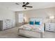 Beautiful main bedroom featuring a ceiling fan, and dual bedside tables at 29243 N 122Nd Ln, Peoria, AZ 85383