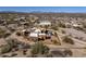 Spacious estate with a private pool, surrounded by desert landscaping, offering a serene and secluded retreat at 31912 N 141St St, Scottsdale, AZ 85262