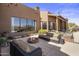 Spacious backyard features outdoor seating area and a cozy fire pit at 31912 N 141St St, Scottsdale, AZ 85262
