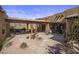 Courtyard features a fountain and comfortable seating, with a horse statue at 31912 N 141St St, Scottsdale, AZ 85262