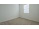 Inviting bedroom with neutral carpet and natural light at 35231 N Danburite Ct, San Tan Valley, AZ 85144