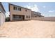 Expansive backyard showing ample space for outdoor activities and landscaping possibilities on a sunny day at 40234 N Alegre Dr, San Tan Valley, AZ 85140