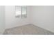 Bedroom with neutral carpeting and a window with horizontal blinds at 40234 N Alegre Dr, San Tan Valley, AZ 85140