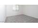 Bright bedroom with neutral carpeting and window with blinds at 40234 N Alegre Dr, San Tan Valley, AZ 85140