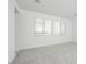 Bedroom featuring neutral carpet, white walls, and lots of light at 40234 N Alegre Dr, San Tan Valley, AZ 85140