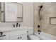 Inviting bathroom featuring a stylish vanity, updated tile, and sleek fixtures at 4115 E Windsor Ave, Phoenix, AZ 85008