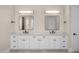 Elegant bathroom with dual vanity, modern fixtures, and ample storage space at 4115 E Windsor Ave, Phoenix, AZ 85008