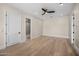 Spacious bedroom with hardwood floors, ceiling fan, and neutral paint at 4115 E Windsor Ave, Phoenix, AZ 85008