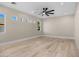 Bright bedroom featuring a ceiling fan, recessed lighting, and light wood flooring at 4115 E Windsor Ave, Phoenix, AZ 85008
