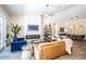 Inviting living room features modern decor, a fireplace, and an open concept design at 4115 E Windsor Ave, Phoenix, AZ 85008
