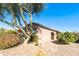 Inviting single-story home with desert landscaping, a terracotta-tiled roof, and a welcoming entrance at 4674 E Alfalfa Dr, Gilbert, AZ 85298