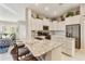 Bright kitchen with granite countertops, stainless steel appliances, and white cabinetry at 4674 E Alfalfa Dr, Gilbert, AZ 85298