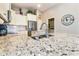 Kitchen sink with granite countertops, stainless steel appliances, and modern faucet at 4674 E Alfalfa Dr, Gilbert, AZ 85298