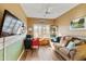 Comfortable office space featuring a sofa and built in shelving at 4674 E Alfalfa Dr, Gilbert, AZ 85298