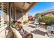 Cozy covered patio with comfortable seating and outdoor decor at 4674 E Alfalfa Dr, Gilbert, AZ 85298