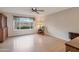 Living room with wood-look flooring and views to the backyard at 4720 E Elena Ave, Mesa, AZ 85206