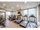State-of-the-art gym with treadmills and stationary bikes offers a diverse workout environment at 4803 N Woodmere Fairway -- # 3009, Scottsdale, AZ 85251