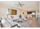 Comfortable living room features neutral tones, modern furnishings, and an open floor plan at 4803 N Woodmere Fairway -- # 3009, Scottsdale, AZ 85251