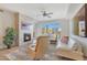 Inviting living room features a fireplace, comfortable seating, and a view of the outdoors at 4803 N Woodmere Fairway -- # 3009, Scottsdale, AZ 85251