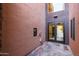 Lobby entrance with tile floor and ADA compliant electronic door activator switch at 4803 N Woodmere Fairway -- # 3009, Scottsdale, AZ 85251