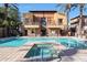 Inviting community pool with a hot tub offers a leisure retreat for residents to relax and socialize at 4803 N Woodmere Fairway -- # 3009, Scottsdale, AZ 85251