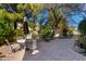 Spacious paver patio with dining and lounge areas, ideal for relaxation and outdoor gatherings at 5234 E Carol Ave, Mesa, AZ 85206