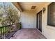 Outdoor balcony with metal railings and a view of the green yard at 5234 E Carol Ave, Mesa, AZ 85206
