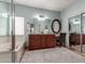 Main bathroom featuring a dual vanity, tub, and walk-in shower at 5234 E Carol Ave, Mesa, AZ 85206
