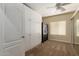 Functional bedroom with built-in storage, carpet flooring, and a secure safe at 5234 E Carol Ave, Mesa, AZ 85206