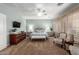 Elegant main bedroom featuring ample natural light, carpet flooring, and stylish furnishings at 5234 E Carol Ave, Mesa, AZ 85206