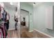Organized walk-in closet with shelves, drawers, and ample hanging space for clothes at 5234 E Carol Ave, Mesa, AZ 85206