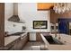 Elegant kitchen features custom cabinetry, a white island, and modern stainless steel appliances at 5812 N 44Th Pl, Phoenix, AZ 85018