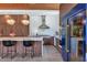 A modern kitchen features with a blue refrigerator and stainless steel appliances at 5812 N 44Th Pl, Phoenix, AZ 85018