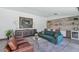 Comfortable living room with stylish decor, custom cabinetry, and ample seating area at 5812 N 44Th Pl, Phoenix, AZ 85018