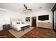 Serene main bedroom with a comfortable bed, wood floors, and a closet at 5812 N 44Th Pl, Phoenix, AZ 85018