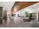 Expansive open floorplan with elegant finishes, glass-enclosed spaces, and contemporary design elements at 5812 N 44Th Pl, Phoenix, AZ 85018