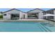 Amazing pool area features a wading area, poolside seating, and a view of the modern home at 5812 N 44Th Pl, Phoenix, AZ 85018