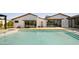 An inviting backyard pool with patio, manicured lawn, and contemporary architecture in the background at 5812 N 44Th Pl, Phoenix, AZ 85018