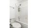 Clean and simple bathroom with a white tiled shower-tub combination and modern toilet, maximizing space at 5995 N 78Th St # 2079, Scottsdale, AZ 85250