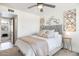 Inviting bedroom with a plush bed, stylish decor, and plenty of natural light creating a relaxing atmosphere at 5995 N 78Th St # 2079, Scottsdale, AZ 85250