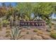 Bella Vita community sign with desert landscaping including cactus, agave, rocks, and trees at 5995 N 78Th St # 2079, Scottsdale, AZ 85250