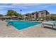 Inviting community pool surrounded by lounge chairs and lush landscaping, perfect for relaxation and recreation at 5995 N 78Th St # 2079, Scottsdale, AZ 85250