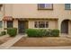 Charming townhouse with a well-maintained lawn and inviting front entrance at 6841 E Osborn Rd # C, Scottsdale, AZ 85251