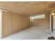Long covered patio space with access door, exterior lights, and open views at 6841 E Osborn Rd # C, Scottsdale, AZ 85251